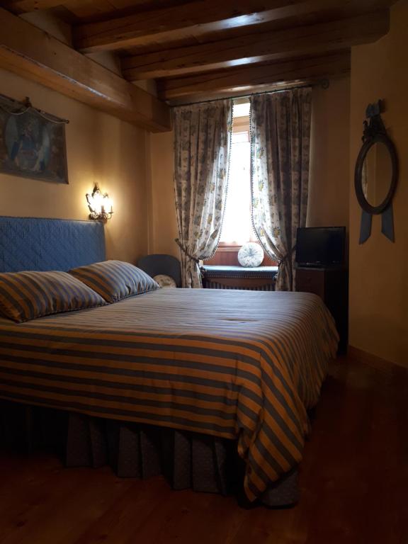 Postel nebo postele na pokoji v ubytování L’Invólt Mountain Lodge