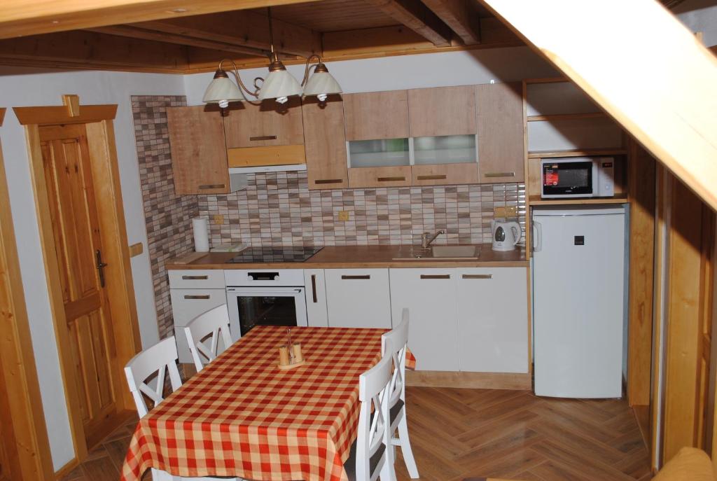 Kuchyň nebo kuchyňský kout v ubytování Roubenka-Mila