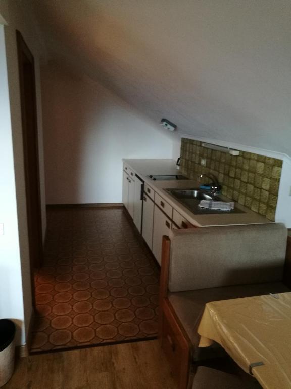 Kuchyň nebo kuchyňský kout v ubytování Residence Terentis