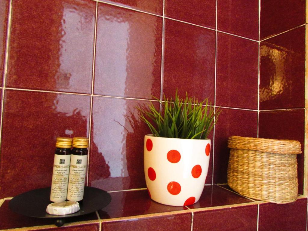 A bathroom at Kallopsia - Glifada Beach Menigos Resort by New Era