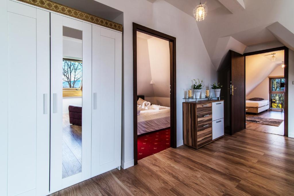 Postel nebo postele na pokoji v ubytování Pałac Margot Nature&SPA