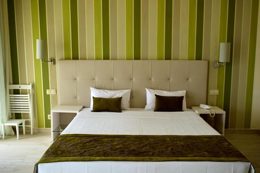 Postel nebo postele na pokoji v ubytování Ouril Hotel Agueda