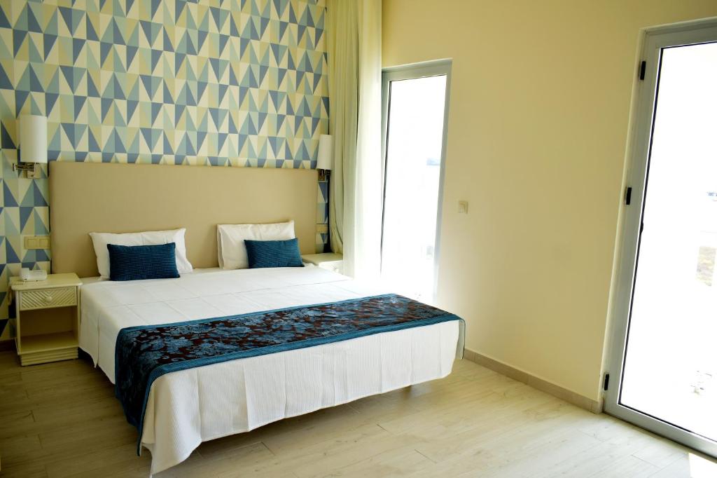 Postel nebo postele na pokoji v ubytování Ouril Hotel Agueda