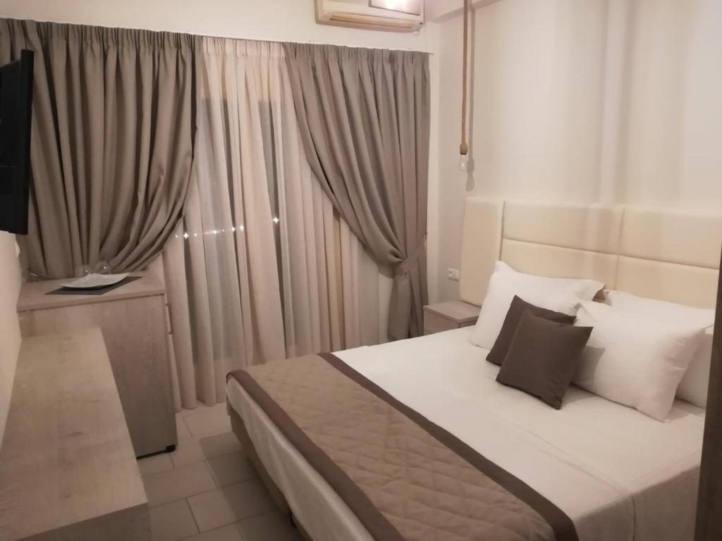 Postel nebo postele na pokoji v ubytování marilena