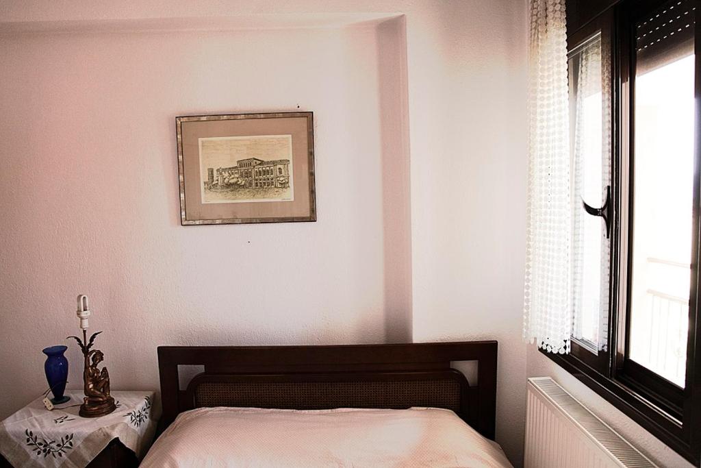 Ein Bett oder Betten in einem Zimmer der Unterkunft Vasiliki´s Apartment