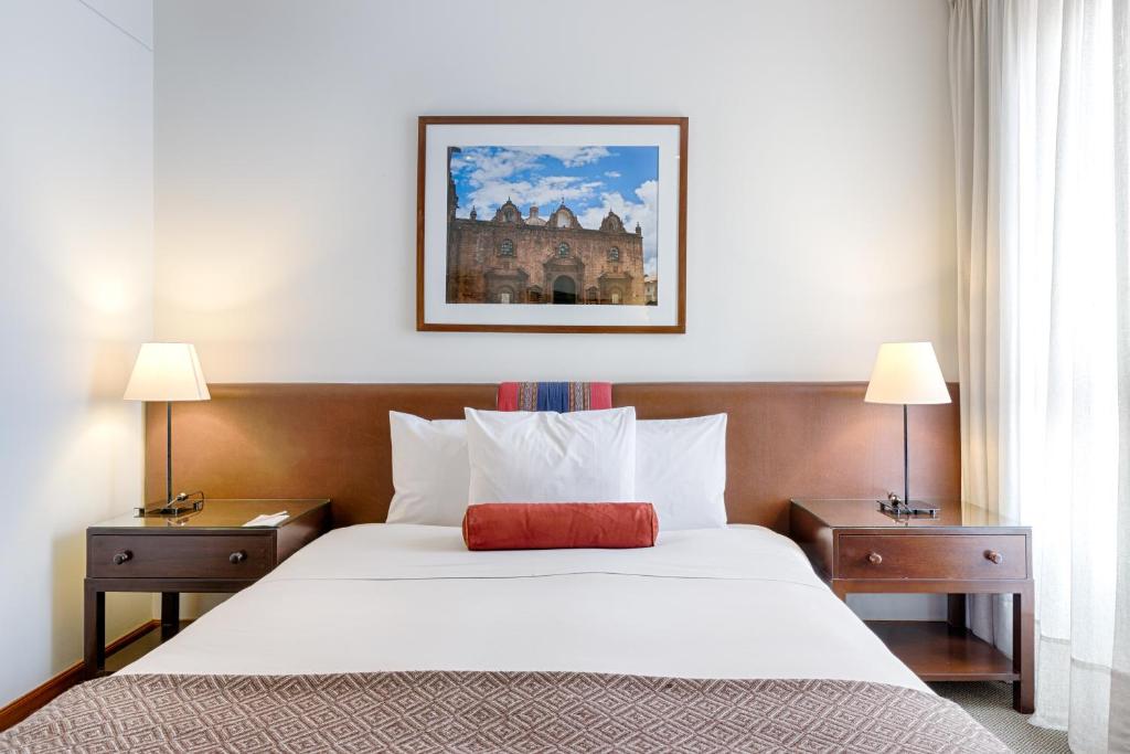 Postel nebo postele na pokoji v ubytování LP Los Portales Hotel Cusco