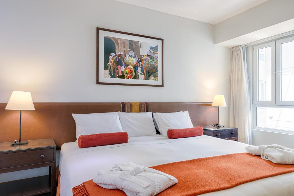 Postel nebo postele na pokoji v ubytování LP Los Portales Hotel Cusco