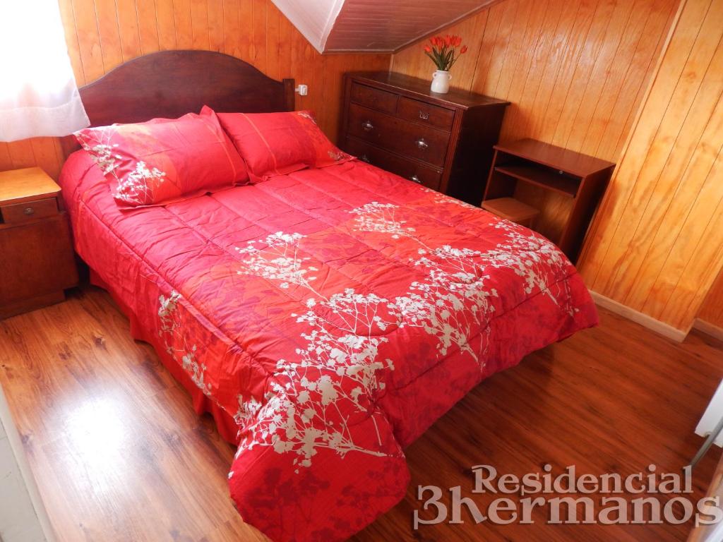 Postel nebo postele na pokoji v ubytování Residencial Tres Hermanos