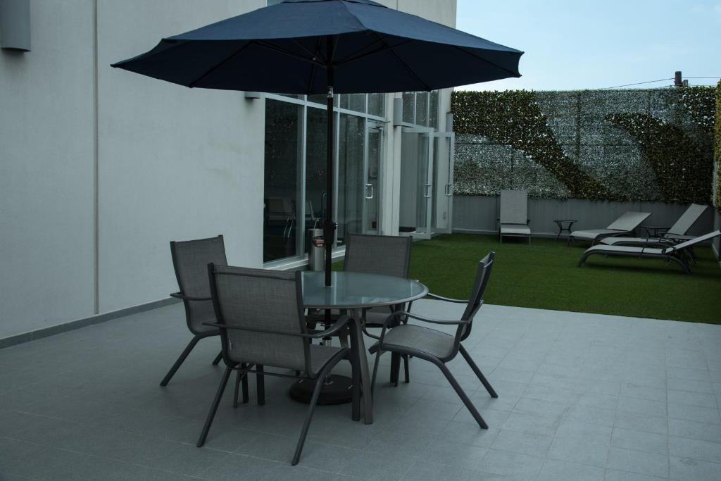 Patio nebo venkovní prostory v ubytování Lithio Hotel