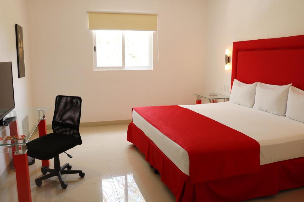 Postel nebo postele na pokoji v ubytování Hotel Zar Merida