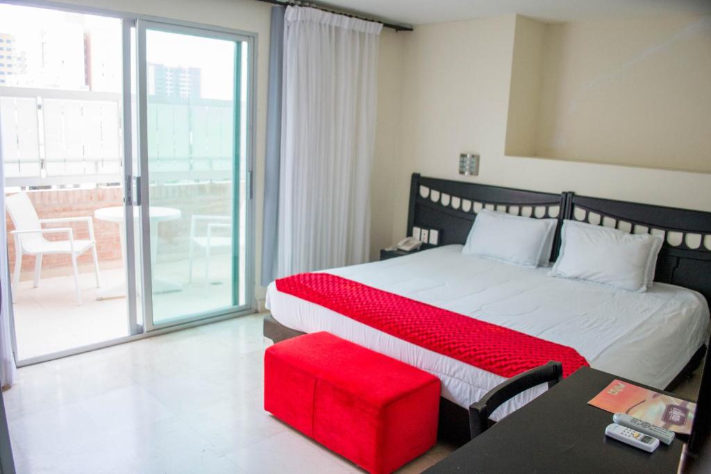 Postel nebo postele na pokoji v ubytování Hotel Suite Continental