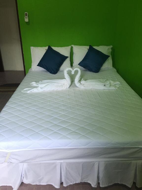 Postel nebo postele na pokoji v ubytování Hero Phuket