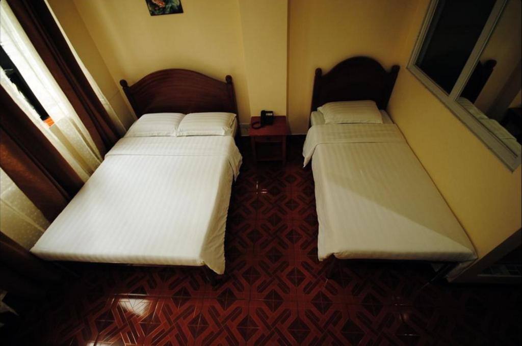 Postel nebo postele na pokoji v ubytování Hotel 45