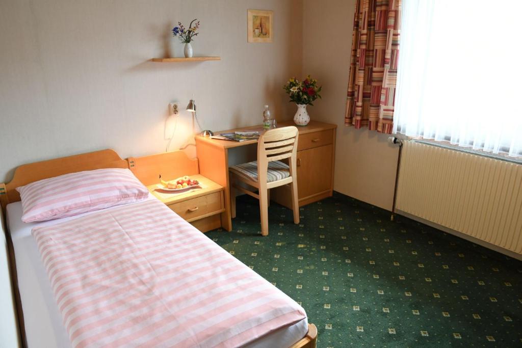 Postel nebo postele na pokoji v ubytování Frühstückspension Binder