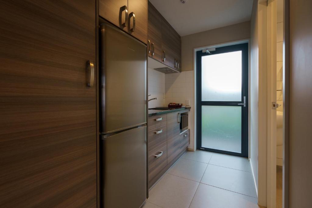 Kuchyň nebo kuchyňský kout v ubytování Apartments 118