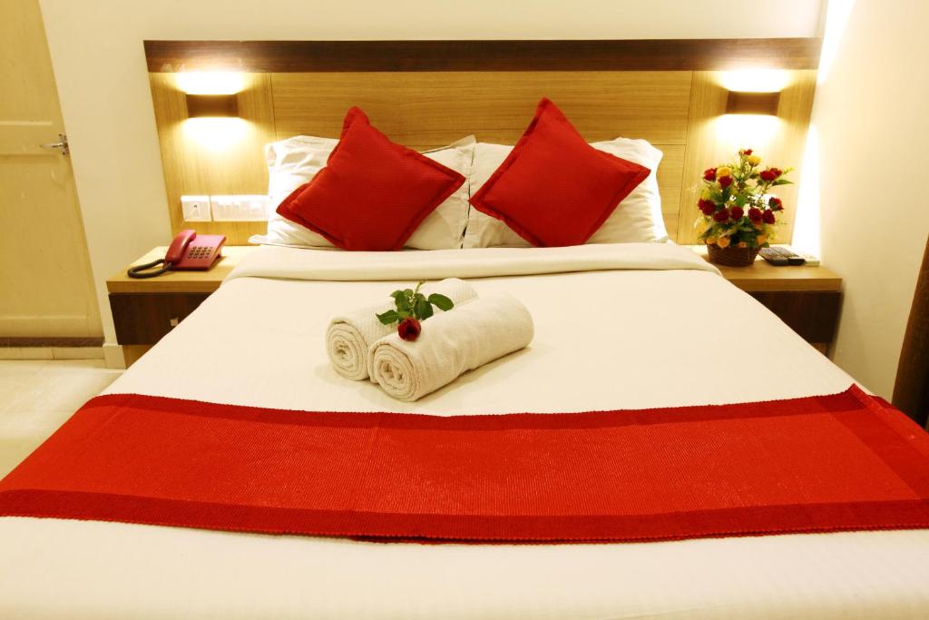 Postel nebo postele na pokoji v ubytování Prayana Hotels