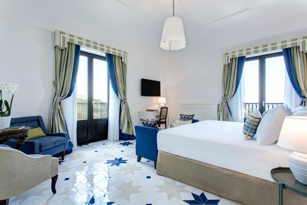 Postel nebo postele na pokoji v ubytování Anna Belle Elegant AgriResort