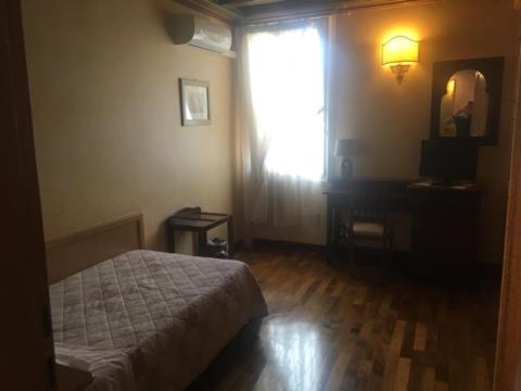 Postel nebo postele na pokoji v ubytování Hotel Il Chiostro