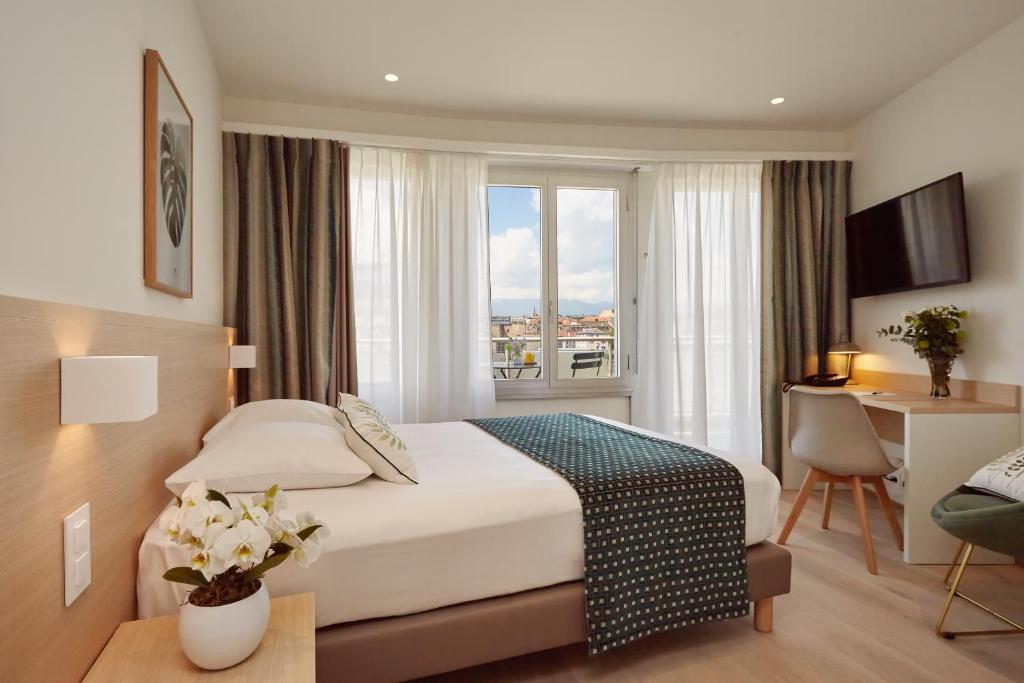 Katil atau katil-katil dalam bilik di Hotel Suisse