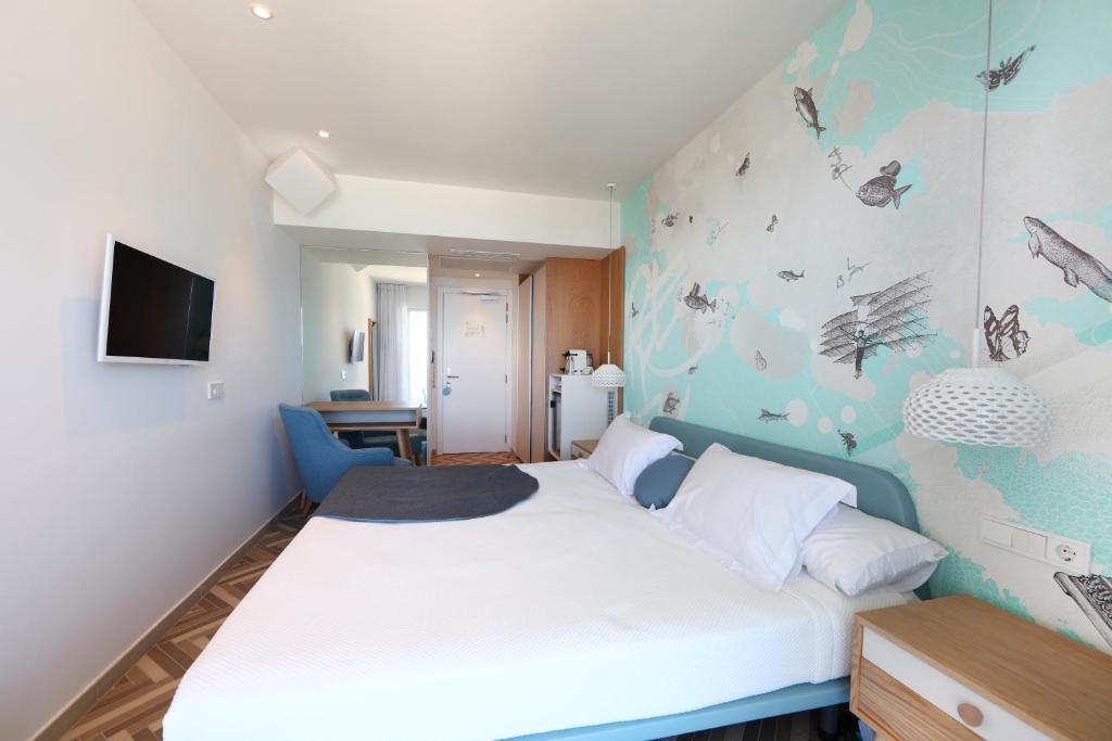 Postel nebo postele na pokoji v ubytování Mar Azul Pur Estil Hotel & Spa