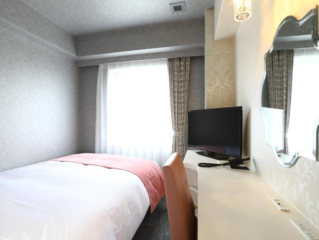 TV a/nebo společenská místnost v ubytování Hotel Wing International Select Osaka Umeda