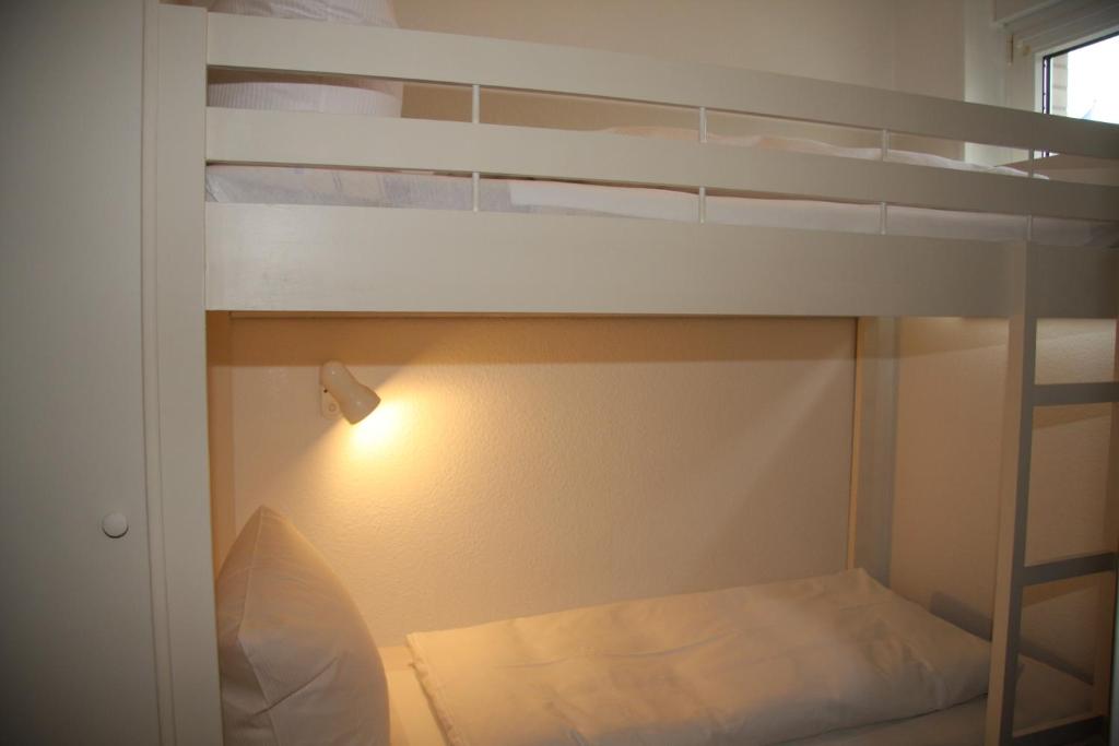 Postel nebo postele na pokoji v ubytování Hotel Christiansen