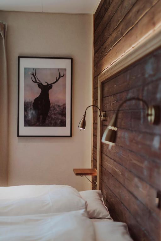 Postel nebo postele na pokoji v ubytování Lydinge Resort