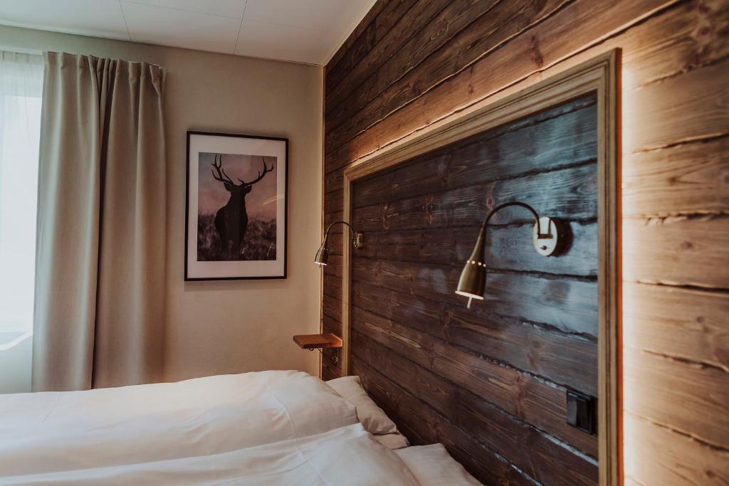 Postel nebo postele na pokoji v ubytování Lydinge Resort