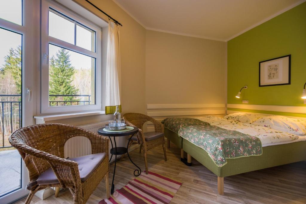 Postel nebo postele na pokoji v ubytování Dom Pod Koziołkami