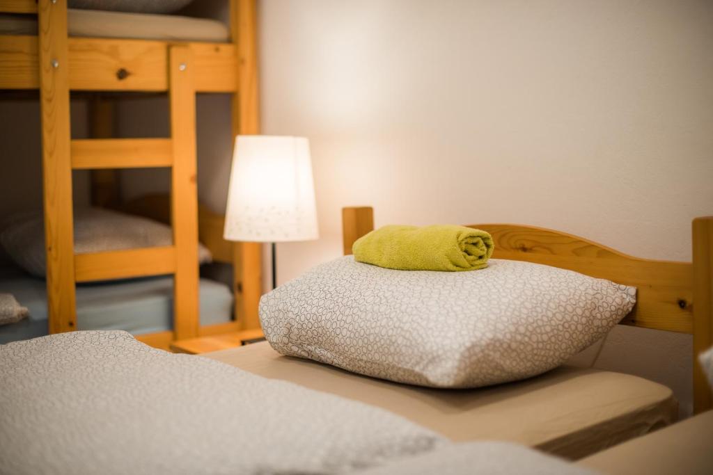 Postel nebo postele na pokoji v ubytování Rooms Kozmus
