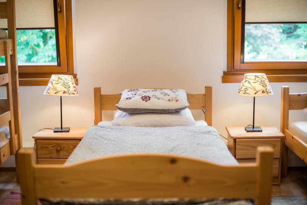 Postel nebo postele na pokoji v ubytování Rooms Kozmus
