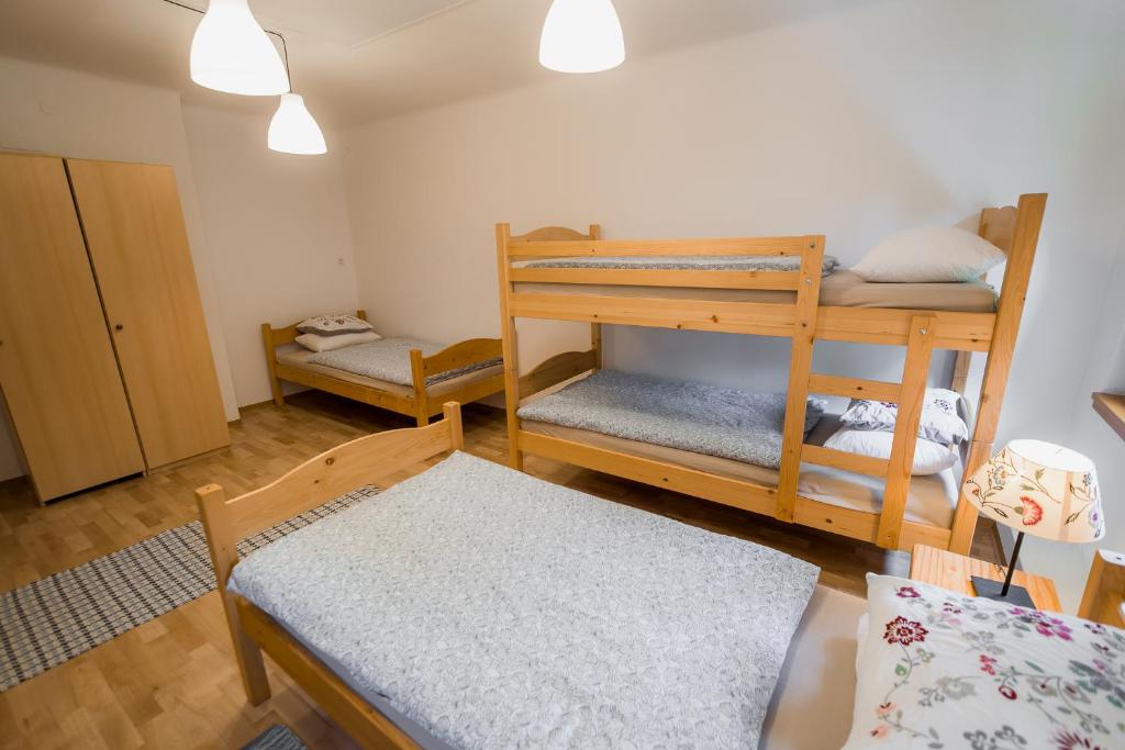 Postel nebo postele na pokoji v ubytování Rooms Kozmus