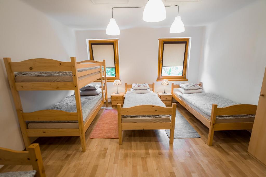 Postel nebo postele na pokoji v ubytování Rooms Kozmus