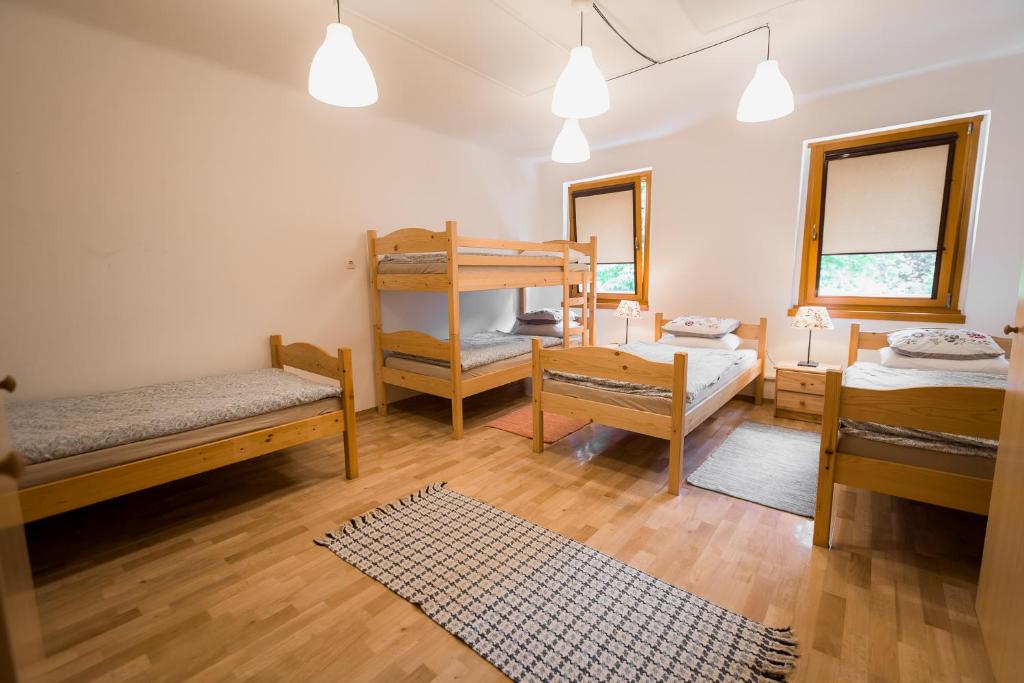 Postel nebo postele na pokoji v ubytování Rooms Kozmus