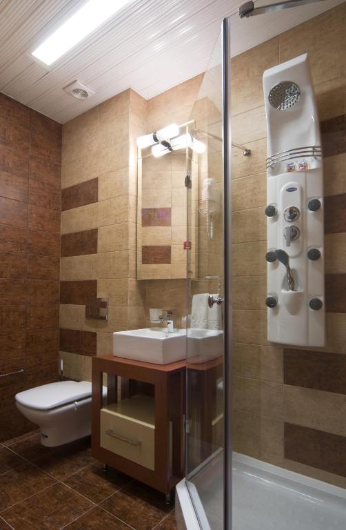Koupelna v ubytování Hotel Ženeva Lux