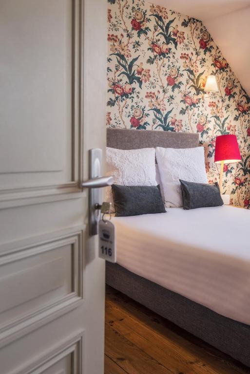 Postel nebo postele na pokoji v ubytování Hotel Edouard VII