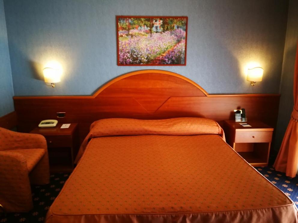 Postel nebo postele na pokoji v ubytování Hotel Lido - Beach and Palace