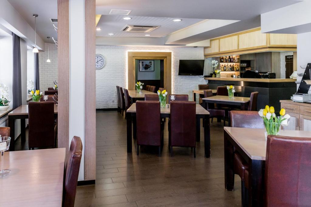 Kuchyň nebo kuchyňský kout v ubytování Hotel Walewscy