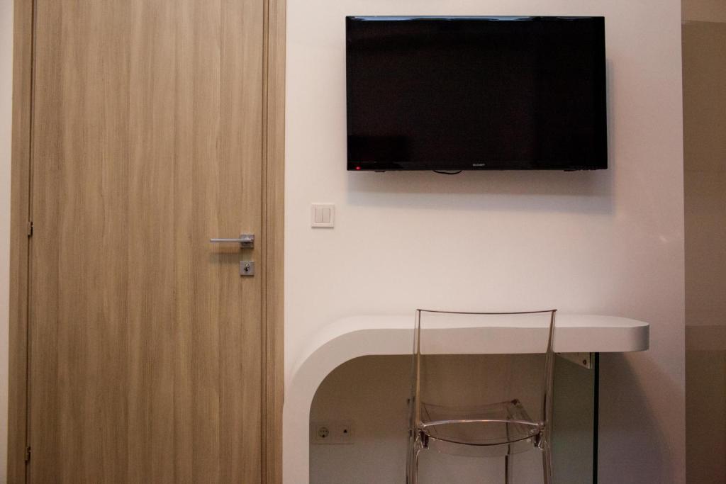 TV a/nebo společenská místnost v ubytování Laura Lifestyle and History