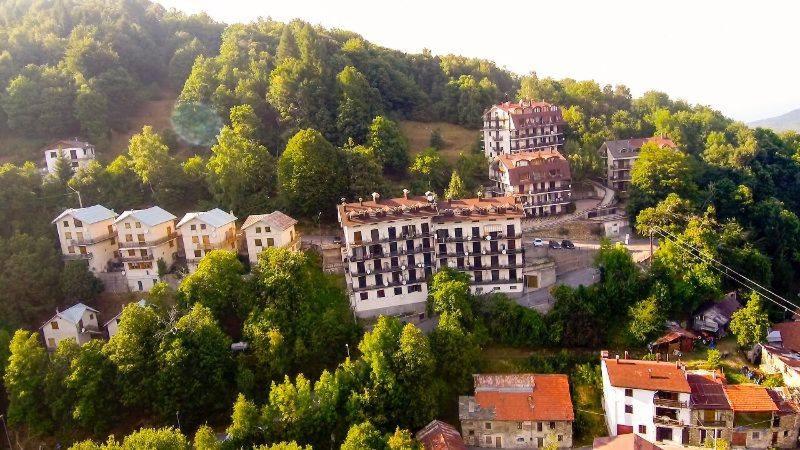 a group of buildings in a town on a hill at San Giacomo di Roburent Cardini CN in San Giacomo