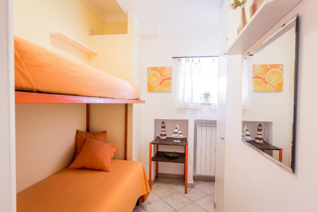 Postel nebo postele na pokoji v ubytování Mandarinoarancio