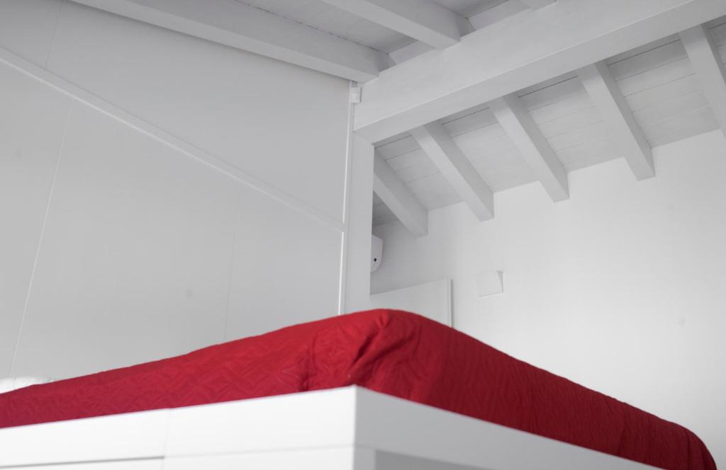Postel nebo postele na pokoji v ubytování Relais Officina del Tempo