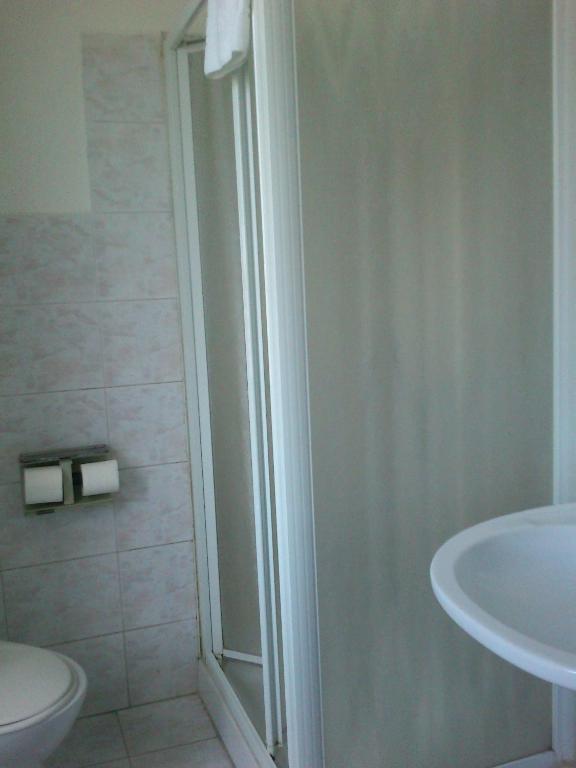Koupelna v ubytování Hotel Dorico