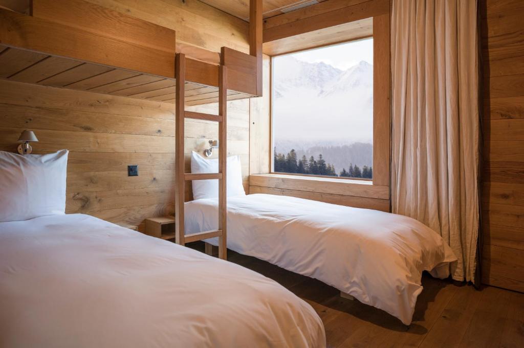 Postel nebo postele na pokoji v ubytování rocksresort