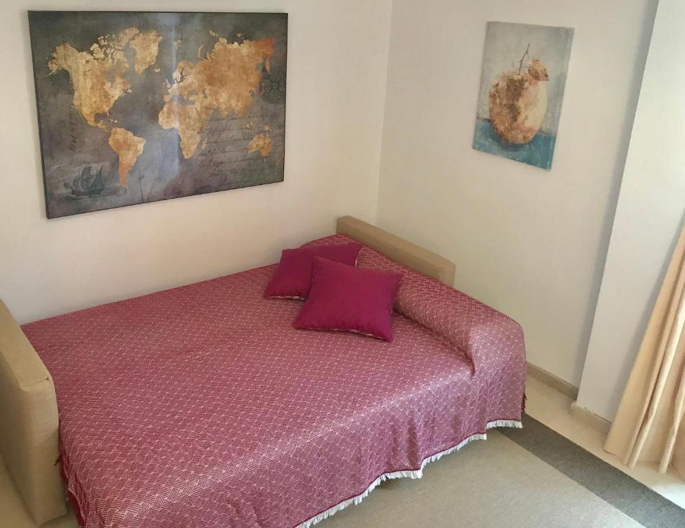 Łóżko lub łóżka w pokoju w obiekcie Casa Volare- estilo y relax en pleno casco antiguo