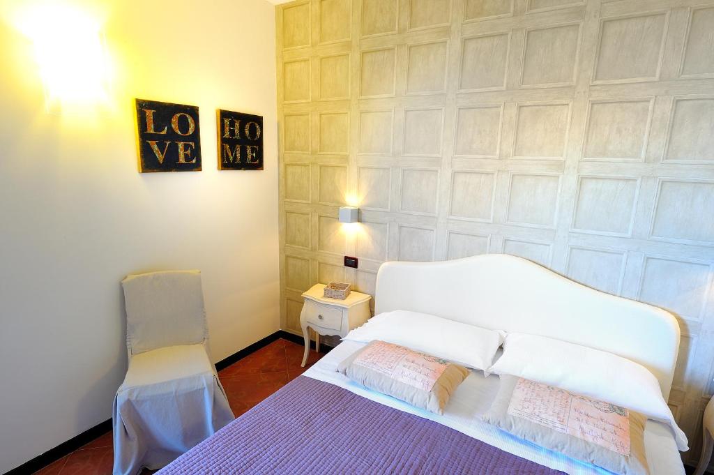 Een bed of bedden in een kamer bij Poggio dei Gorleri