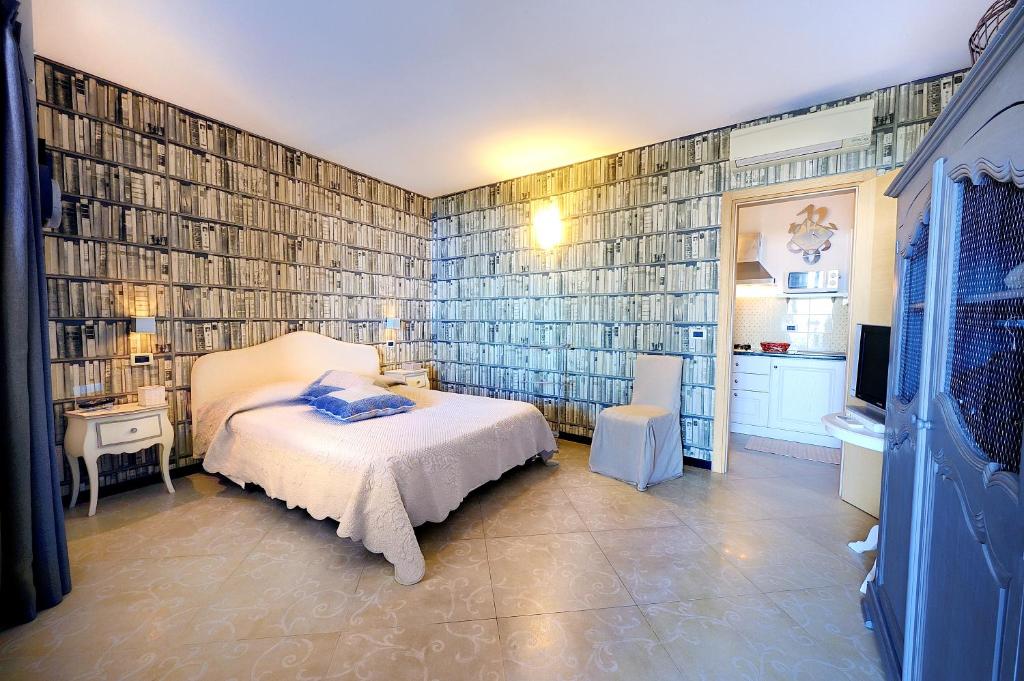Een bed of bedden in een kamer bij Poggio dei Gorleri
