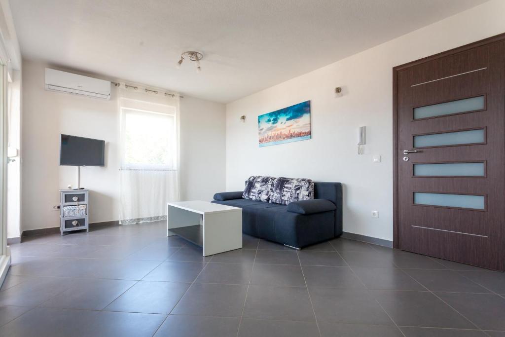 TV a/nebo společenská místnost v ubytování Luxury Villa Allen with Pool
