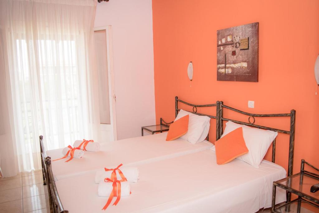 Postel nebo postele na pokoji v ubytování Mirsini Apartments