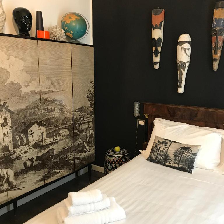 Łóżko lub łóżka w pokoju w obiekcie L'8 Boutique Design Apartments
